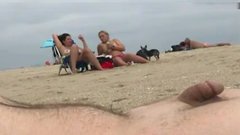 Beach Voyeur Dick - Guy jerking off at beach meets a nudist woman and she sucks dick